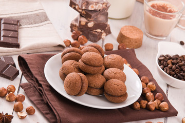 Hazelnut shortbread sandwiches filled with chocolate cream.