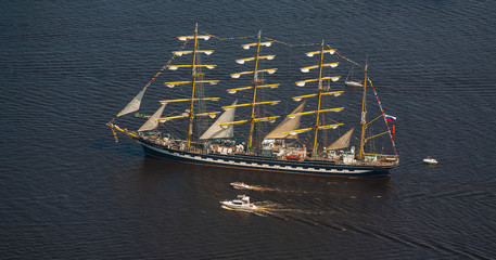 A large sailboat goes along the water area of the Daugava River.
The last windjammer bark...