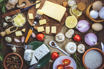 different cheeses and ingredients for cooking