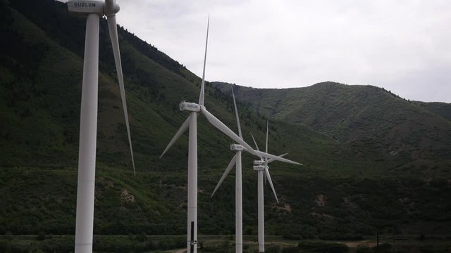 line of wind turbines uhd 4k
