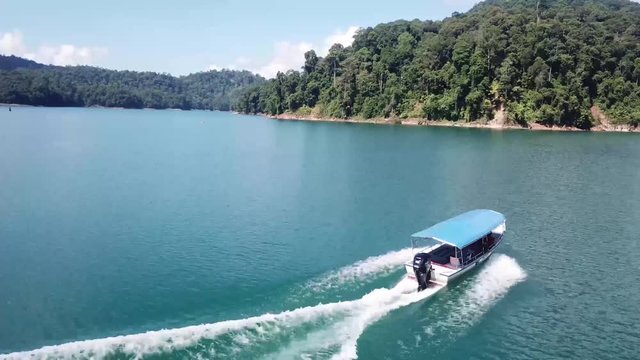 Aerial: Speedboat on a beautiful Lake, Malaysia
