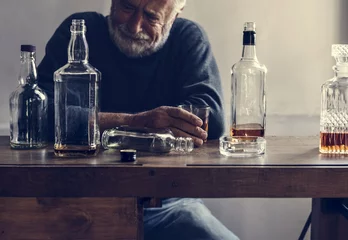 Fotobehang Elderly man drinking alcohol © Rawpixel.com