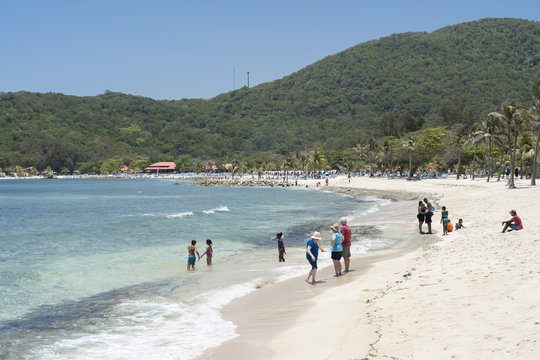People enjoying the beach in Haiti