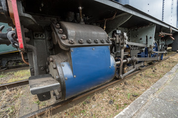 Naklejka premium an iron wheel of a steam train