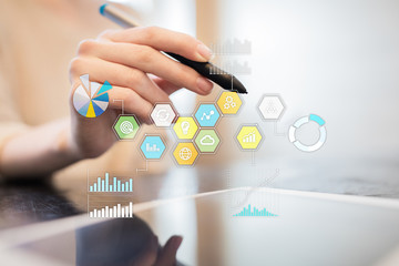 Colored applications icons and graphs on virtual screen. Business, internet and technology concept.