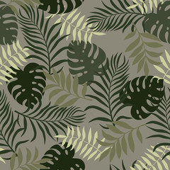 Tropical background with palm leaves. Seamless floral pattern. Summer vector illustration