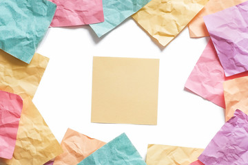 Framed Background of many colored crumpled reminder notes