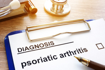 Diagnosis psoriatic arthritis and clipboard on a desk. - obrazy, fototapety, plakaty