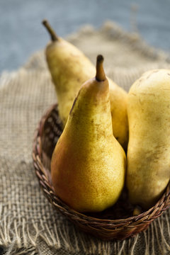 Ripe and sweet pears on wooden table