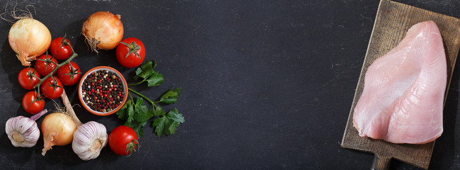 fresh turkey meat with ingredients for cooking