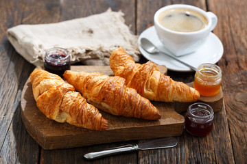 breakfast with croissants and cup of coffee