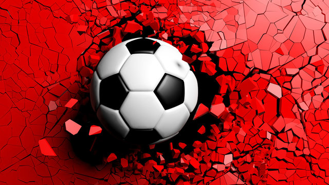 Soccer ball breaking forcibly through a red wall. 3d illustration. © viperagp