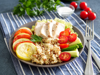 Healthy vegetable buddha bowl lunch with turkey, vegetables and