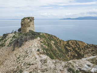 Fototapeta na wymiar Torre Degli Appiani. Island in Punta Ala. Italy