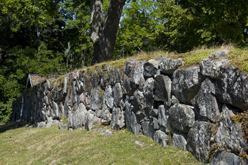 Stone wall at H&auml;rkeberga church from 14th century, between Stockholm and Enk&ouml;ping