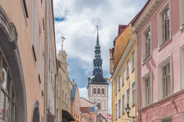 Fototapeta na wymiar Tallinn in Estonia, panorama of the medieval city with St Nicolas church and colorful houses 