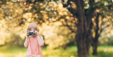 Little photographer outdoors