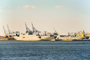 Commercial sea ships, dry cargo ships in a Hudson Gulf. New York, USA.