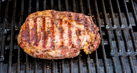 Beef steak on the grill