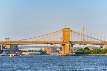 Suspended Brooklyn Bridge across Lower Manhattan and Brooklyn. New York, USA.