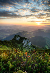 Obraz premium Sunrise on mountain at summer