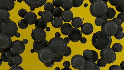 Black spheres of random size on yellow background