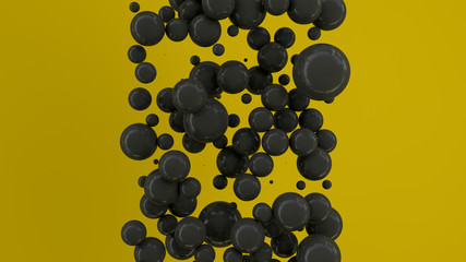 Black spheres of random size on yellow background
