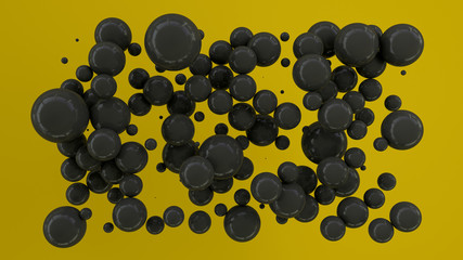 Black spheres of random size on yellow background