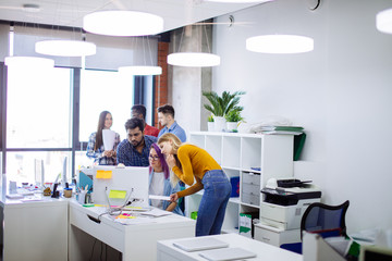 startup business multiethnic team discussing new business plan in modern bright office interior...