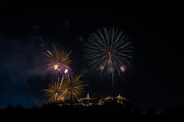 Fototapeta na wymiar Beautiful fireworks with Phra Nakhon Khiri ancient place (Khao Wang) landmark of Phetchaburi Province Thailand
