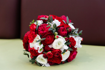 Beautiful wedding bouquet with red and white roses