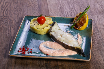 Halibut fillet with mushed potato © Andrei Starostin