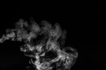 White smoke isolated on black background.