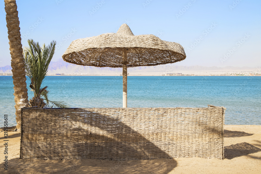 Canvas Prints Straw umbrella on tropical beach