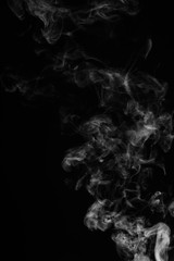 White smoke isolated on black background.