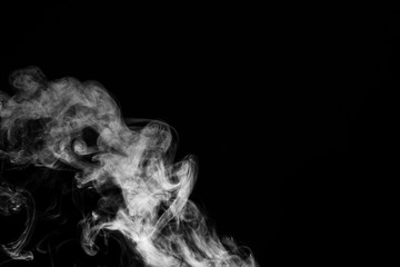 White smoke isolated on black background.