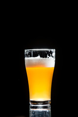 craft beer glass on black background
