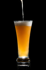 craft beer glass on black background