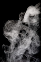 White smoke isolated on black background.