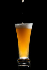 craft beer glass on black background