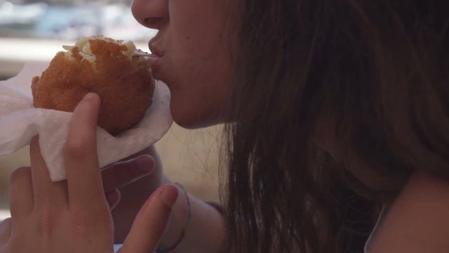 Beating typical Italian food, Arancina stringy cheese
