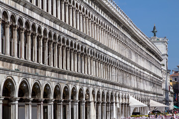 Fototapeta premium Arcades of the facade on Piazza San Marco in Venice, Italy