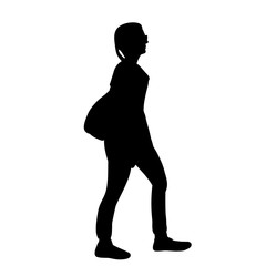 silhouette girl with a backpack is coming