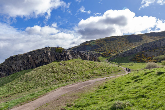 A hillwalking route through grassy slopes up to Arthur’s Seat, the highest point in Edinburgh located at Holyrood Park, Scotland, UK