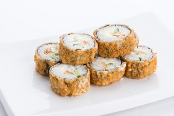 Sushi set and composition at white background. Japanese food restaurant, sushi maki gunkan roll plate or platter set.