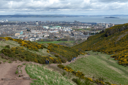 View of Edinburgh city towards coastal area of the North Sea from Arthur’s Seat, the highest point in Edinburgh located at Holyrood Park, Scotland, UK