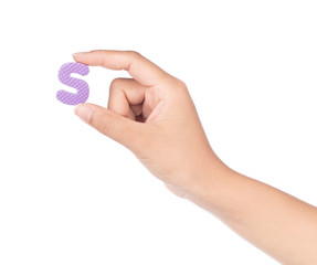 hand holding alphabet made from EVA foam isolated on white background