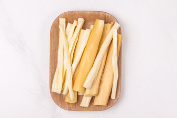 Healthy Snack. Smoked string cheese. Kobarcik. Selective focus