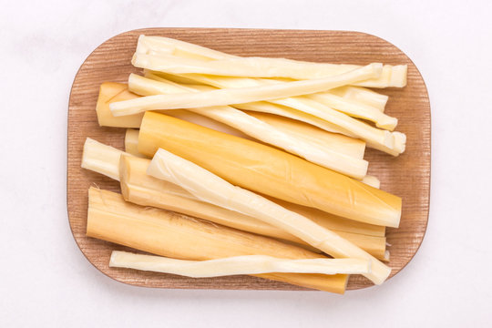 Healthy Snack. Smoked string cheese. Kobarcik. Selective focus