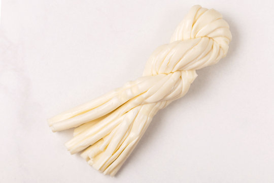 Healthy Snack. Smoked string cheese. Kobarcik. Selective focus